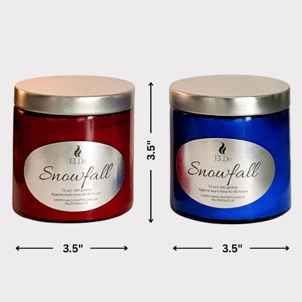 Two 'Snowfall' candles, one red and one blue, with dimensions indicated on a white background.