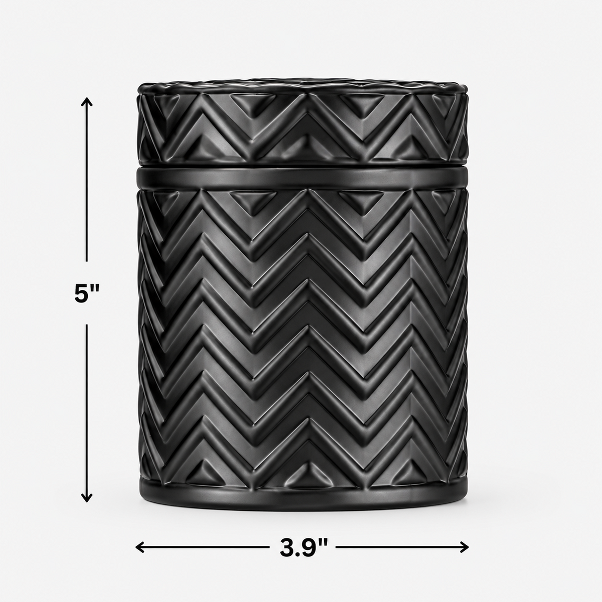 Matte black Onyx Moon candle vessel with matching chevron-patterned lid, shown with dimensions of 5 inches tall and 3.9 inches wide.