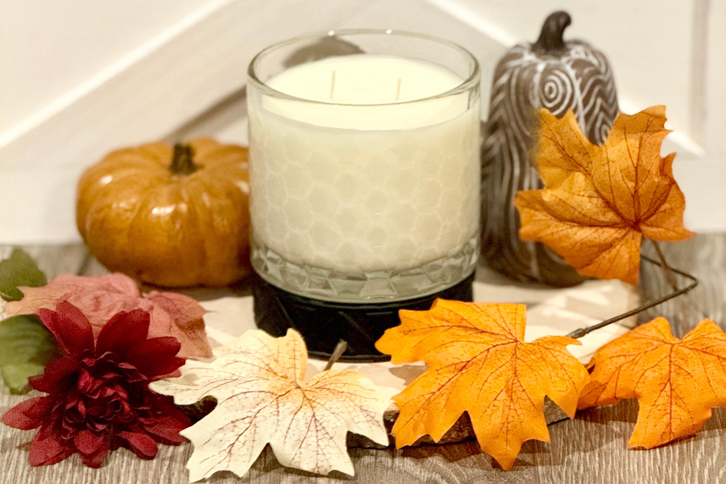 Hand-poured candle with pumpkin fragrance, part of HexaGlow’s luxury home collection.