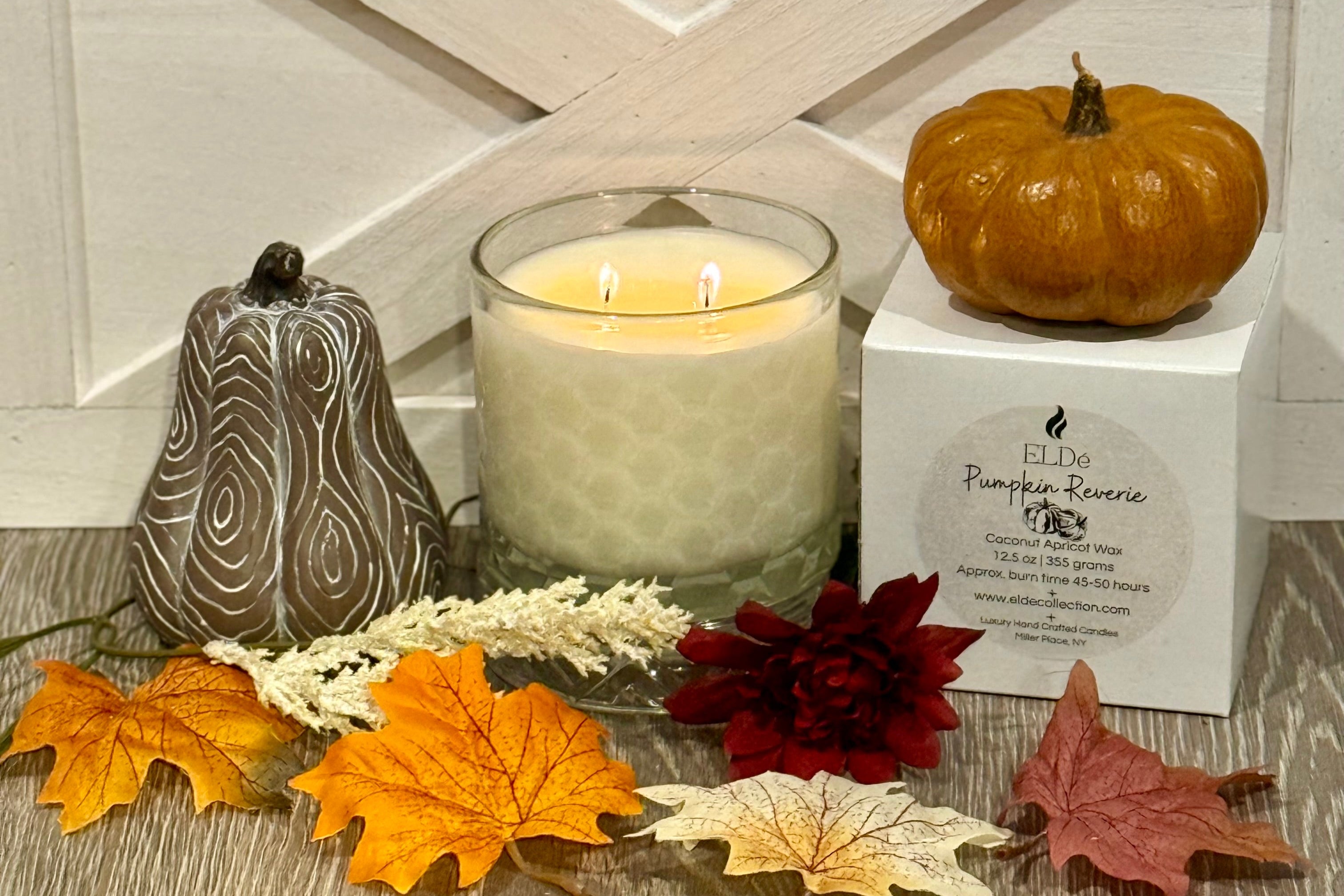Pumpkin Reverie scented candle by HexaGlow, elegant jar with warm fall décor setting.