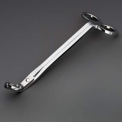Wick Trimmer – styled next to a candle for context