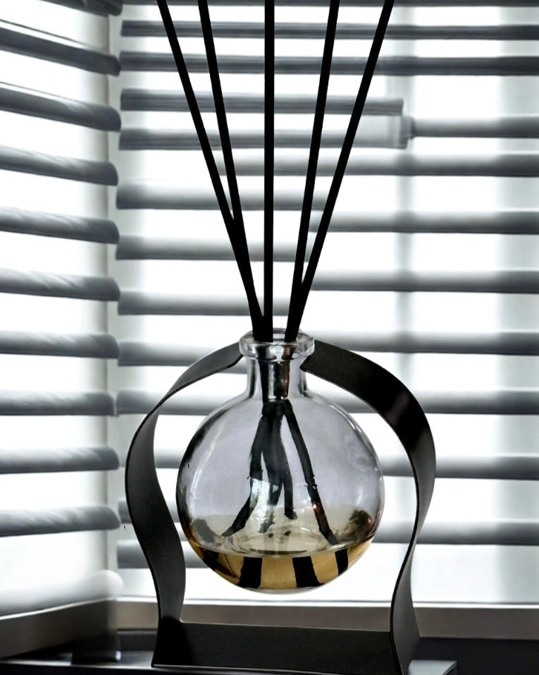 Radiance Reed Diffuser - Lavender & Vanilla Bliss front view, sleek glass design