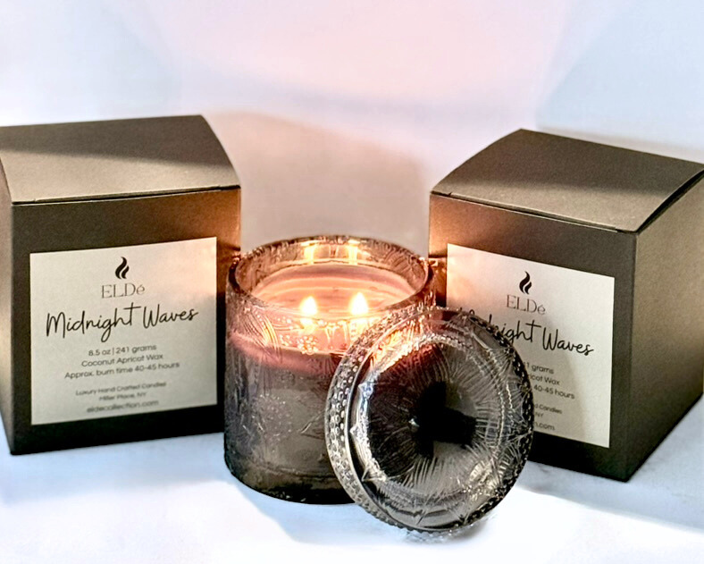 Lotus flower candle with black wax and two gift boxes with nice labels