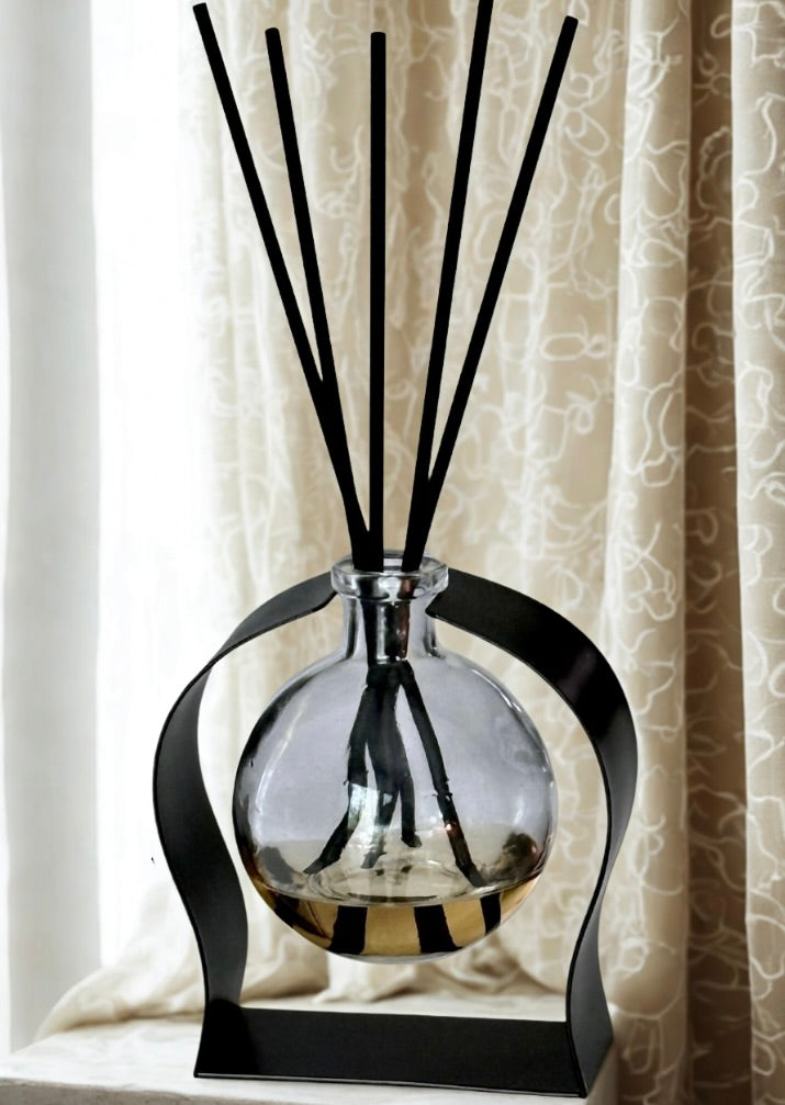 Radiance Reed Diffuser - Oakmoss & Amber Grove top view, reed arrangement visible
